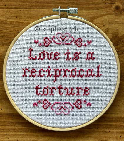 Love Is A Reciprocal Torture - Framed Cross-Stitch